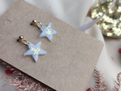 boucle d'oreille étoile blanche