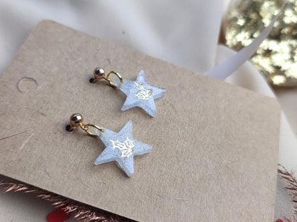 boucle d'oreille étoile blanche