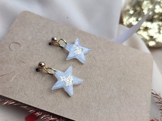 boucle d'oreille étoile blanche